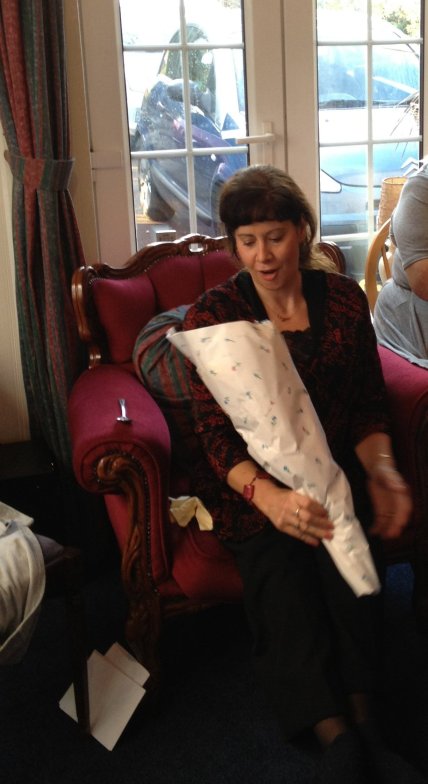 Caroline Cox admires her flowers from the cast