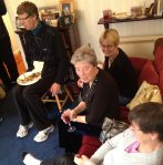 The cast, singers and musicians enjoy the buffet.